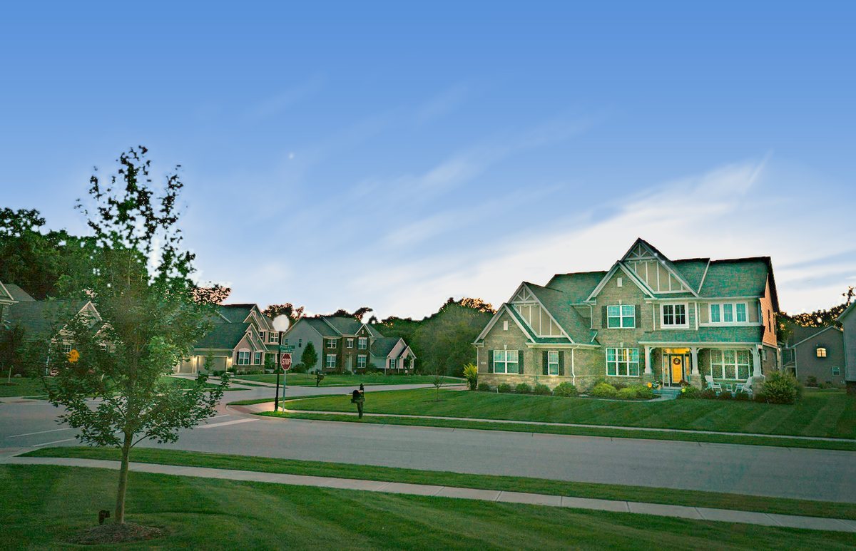 Houses along a quiet street on a clear morning